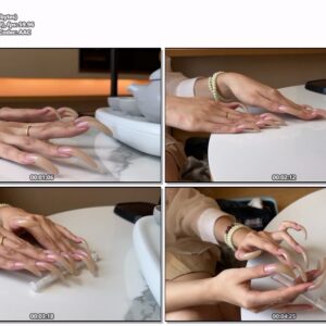 #805 - Sideview Of My Shiny Natural Nails On The Table
